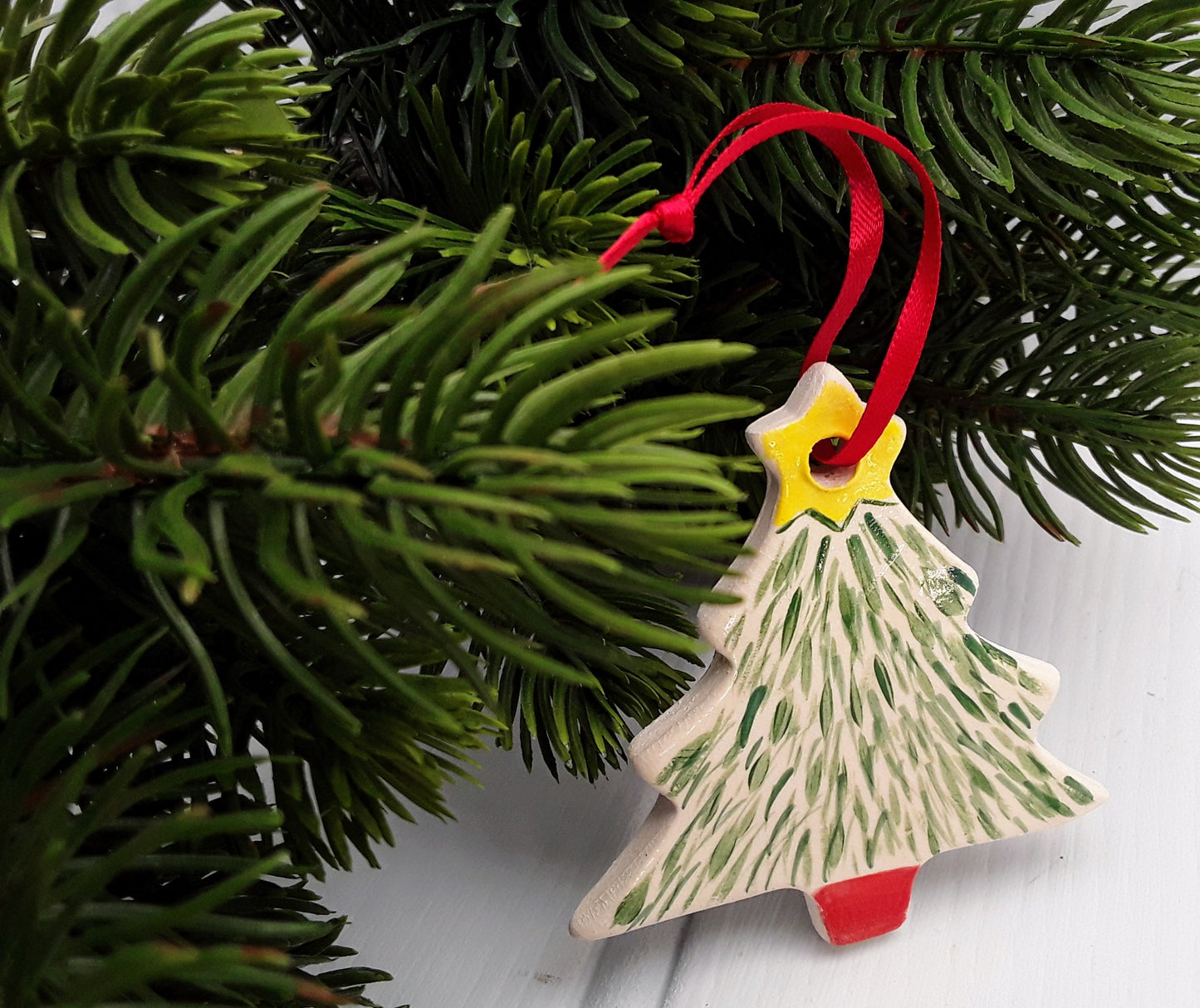 Ceramic Christmas tree decoration - Snowy Christmas tree in a bright red pot topped with a star