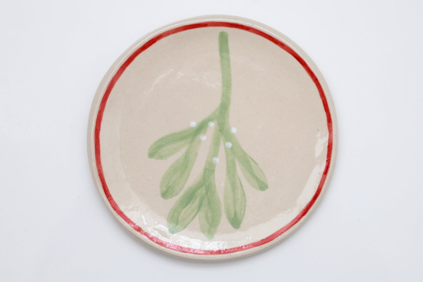 Ceramic stoneware plates with a mistletoe design. Handmade, hand-painted. Sea Bramble Ceramics. Decorative plates.