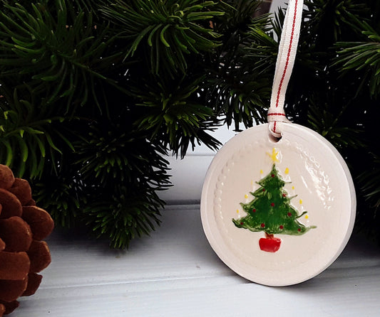 Circular ceramic Christmas tree decoration with Victorian Xmas tree motif