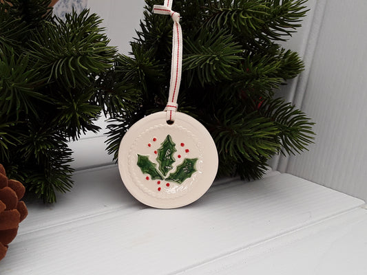 Circular Ceramic Christmas tree decoration with Holly motif