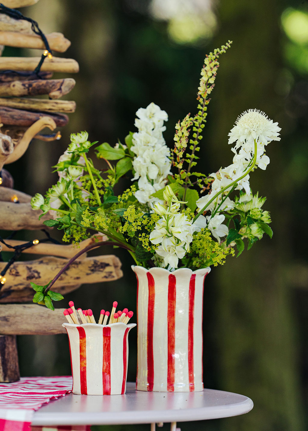 Sea Bramble Ceramics' Handmade, Daisy vase, red stripes and Sea Brambles' signature scalloped top. Matching matchstriker in a Christmas scene