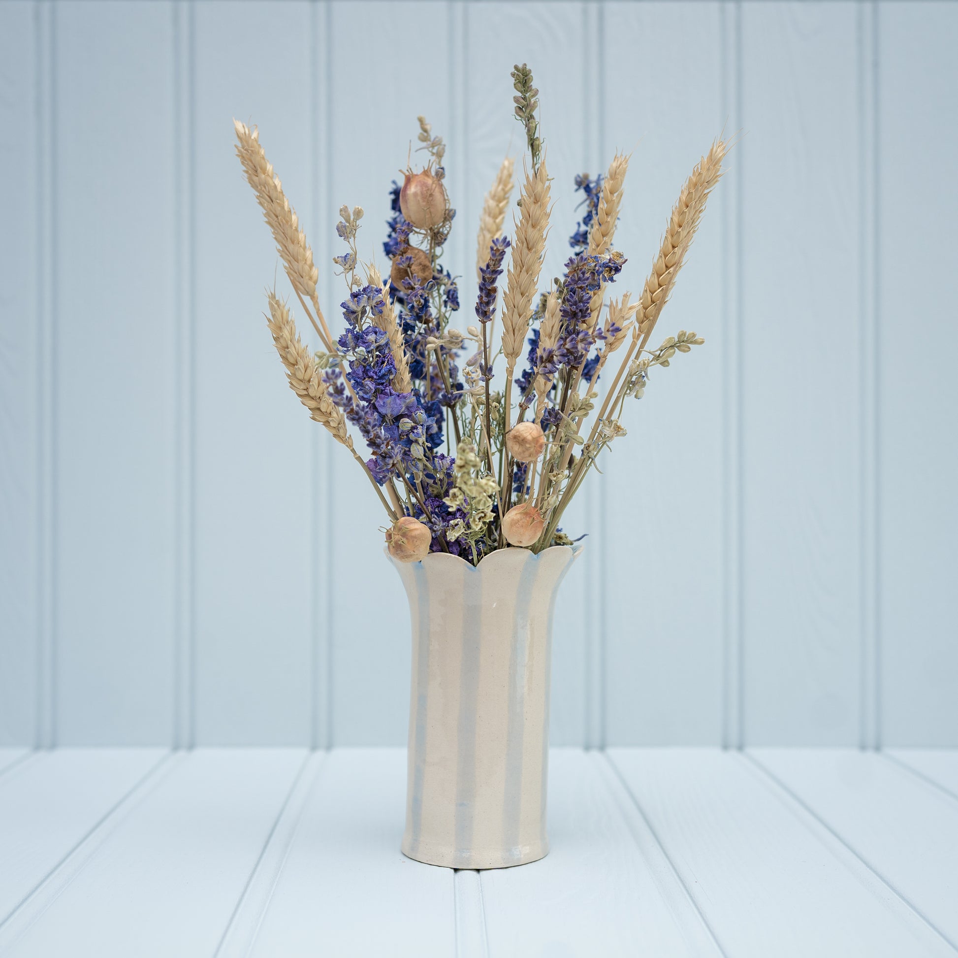 Sea Bramble Ceramics' Handmade, Stoneware Daisy vase, Baby blue stripes and Sea Brambles' signature scalloped top.