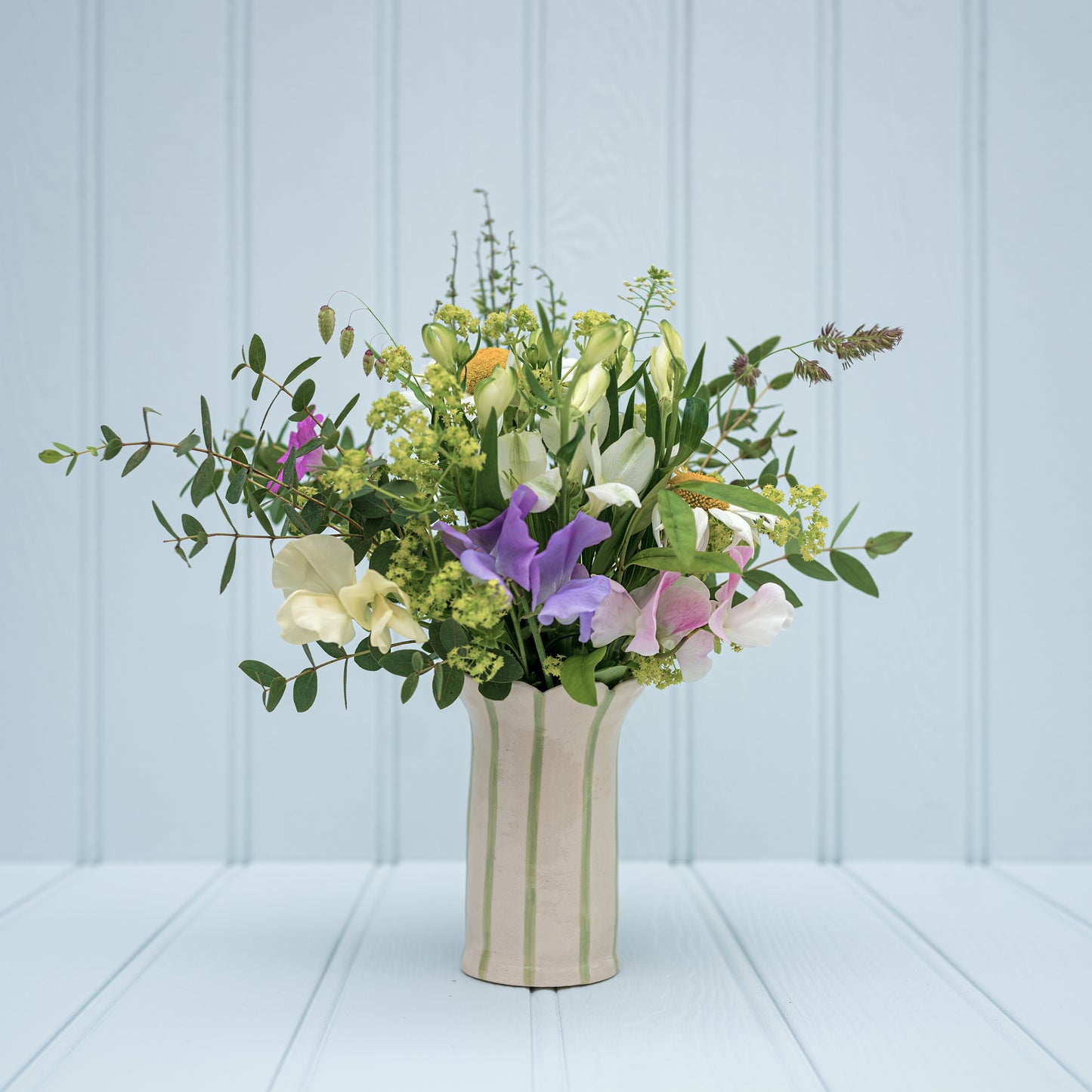 Sea Bramble Ceramics' Handmade, Stoneware Daisy vase, sage stripes and Sea Brambles' signature scalloped top.