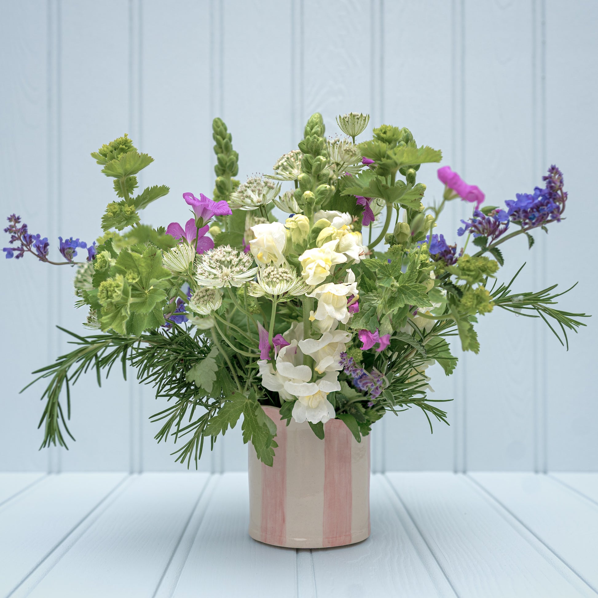 Sea Bramble Ceramics - Handmade Daisy Planter with beautiful flower arrangement. Shown here in pink.