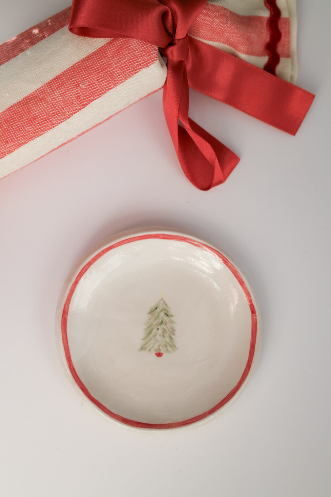 Ceramic stoneware plates with a Christmas tree design. Handmade, hand-painted. Sea Bramble Ceramics. Decorative plates.