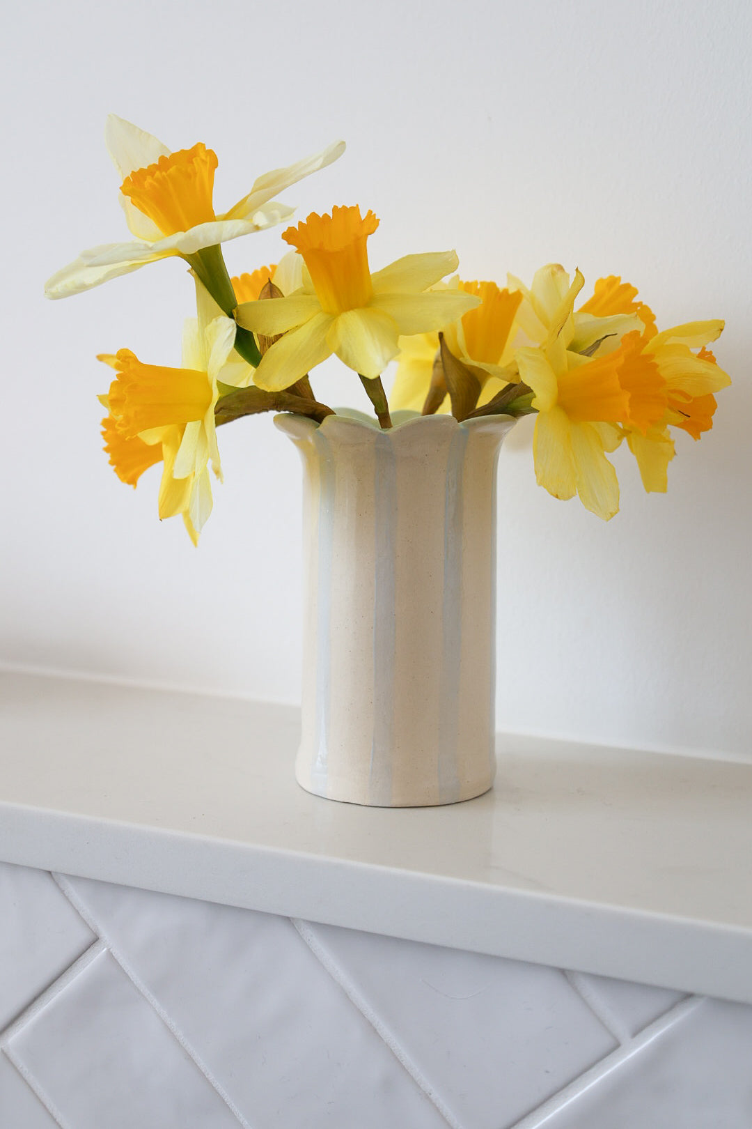 Sea Bramble Ceramics' Handmade, Daisy vase, blue stripes and Sea Brambles' signature scalloped top.