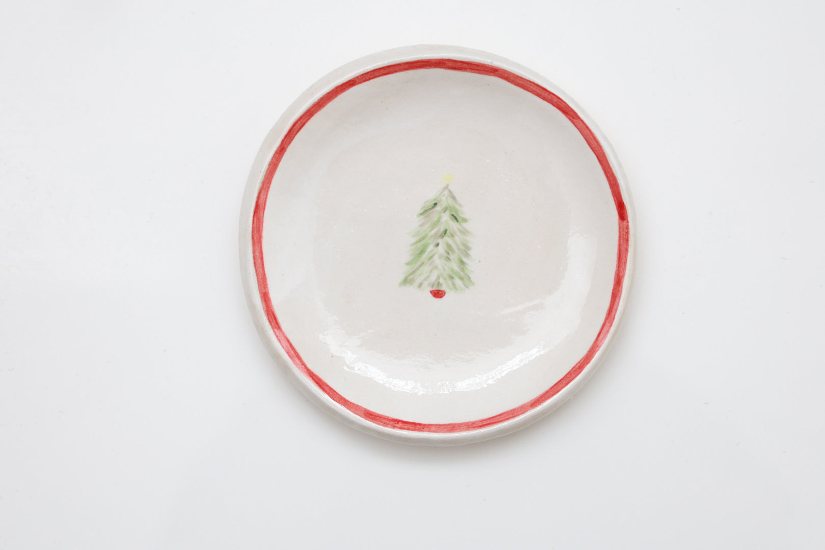 Ceramic stoneware plates with a Christmas tree design. Handmade, hand-painted. Sea Bramble Ceramics. Decorative plates.