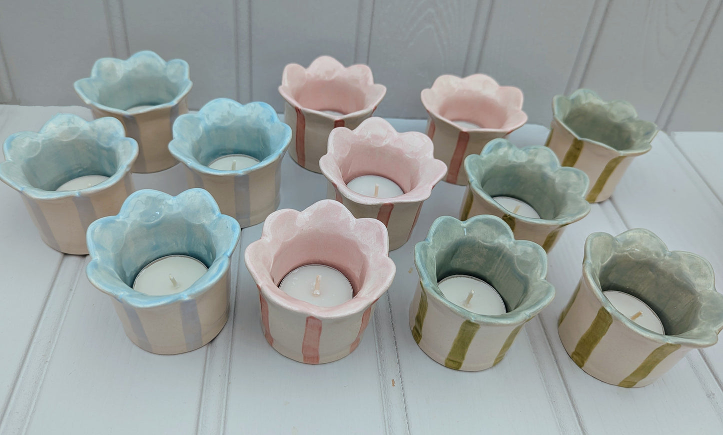 Sea Bramble Ceramics - Homemade Earthenware Striped and Scalloped tealight holders. Shown in Pink, Baby blue and Sage.