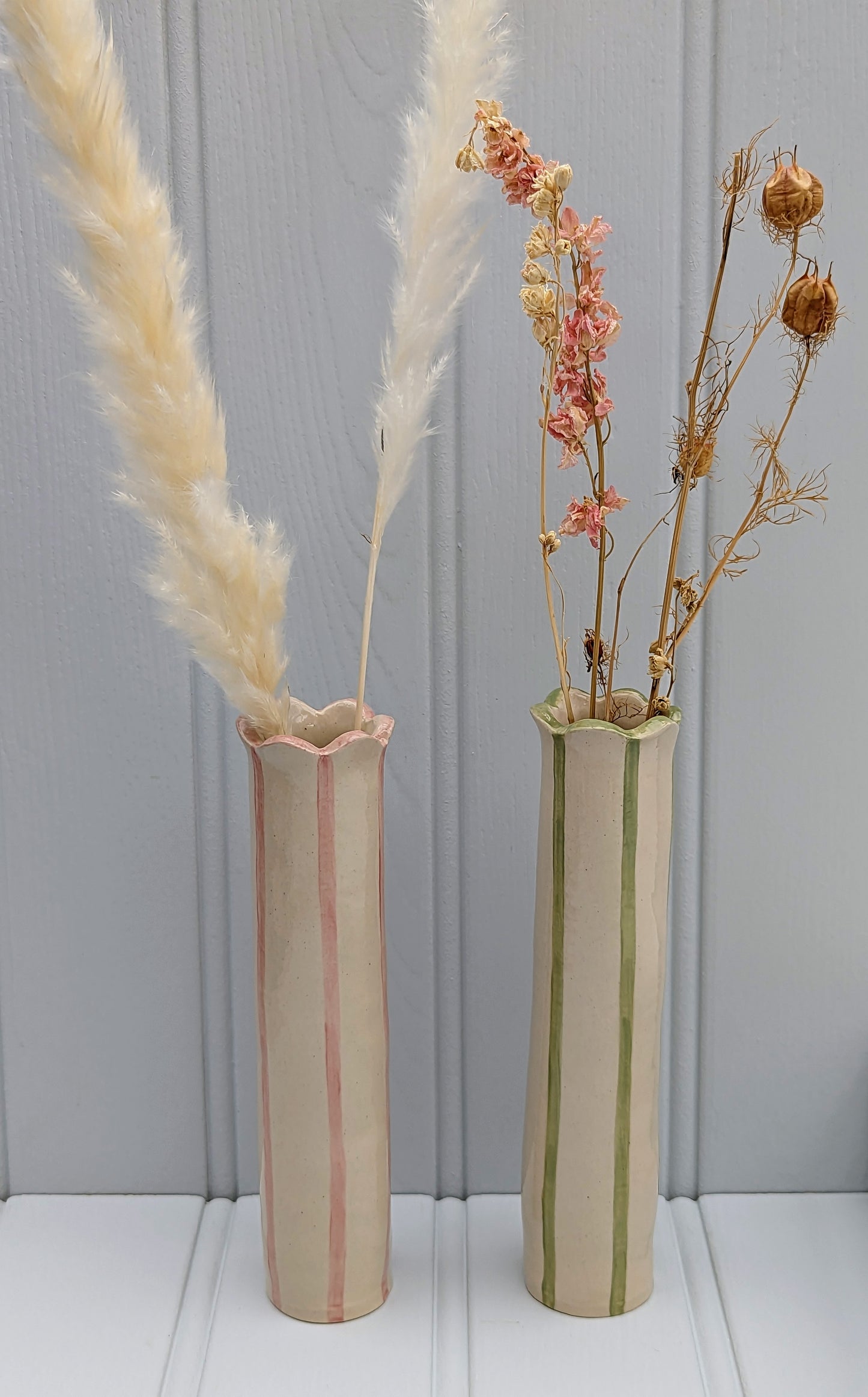 Two tall Sea Lavender vases. One pink and one sage