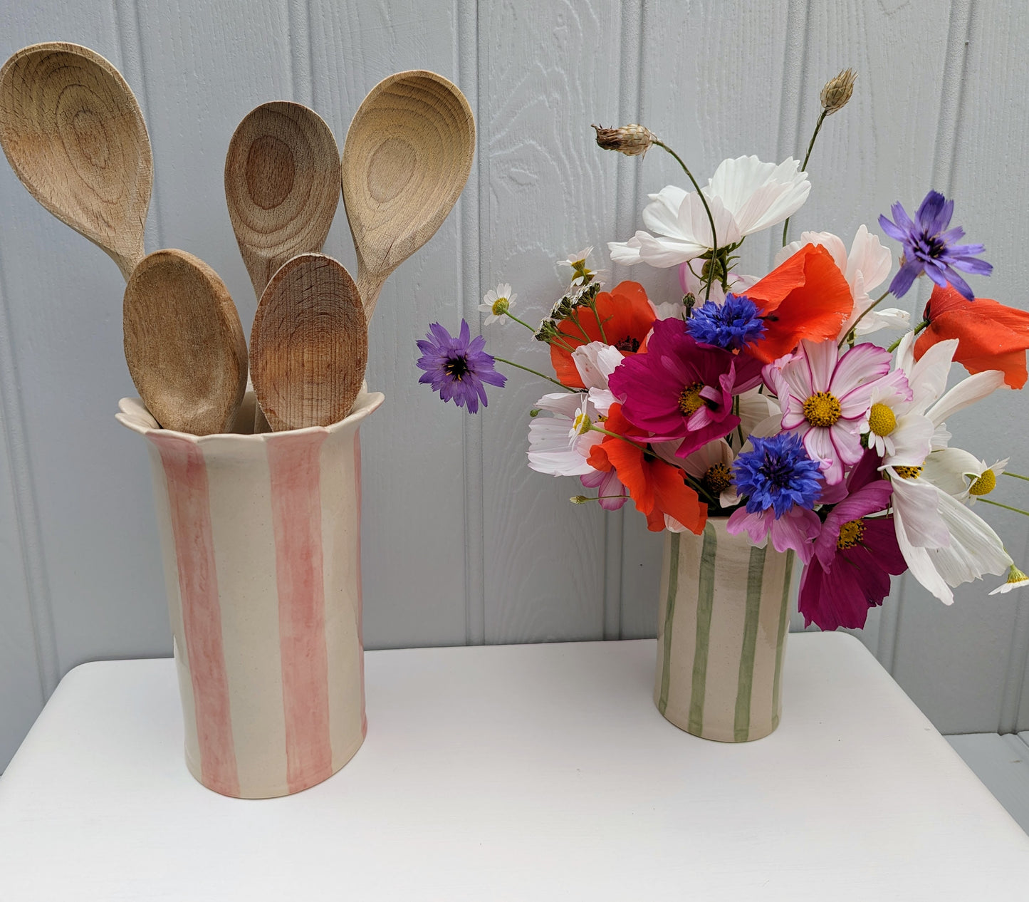 Sea Bramble Ceramics - Handmade kitchen Utensil holder, in pink. Shown with Sea Brambles' Sage daisy vase.