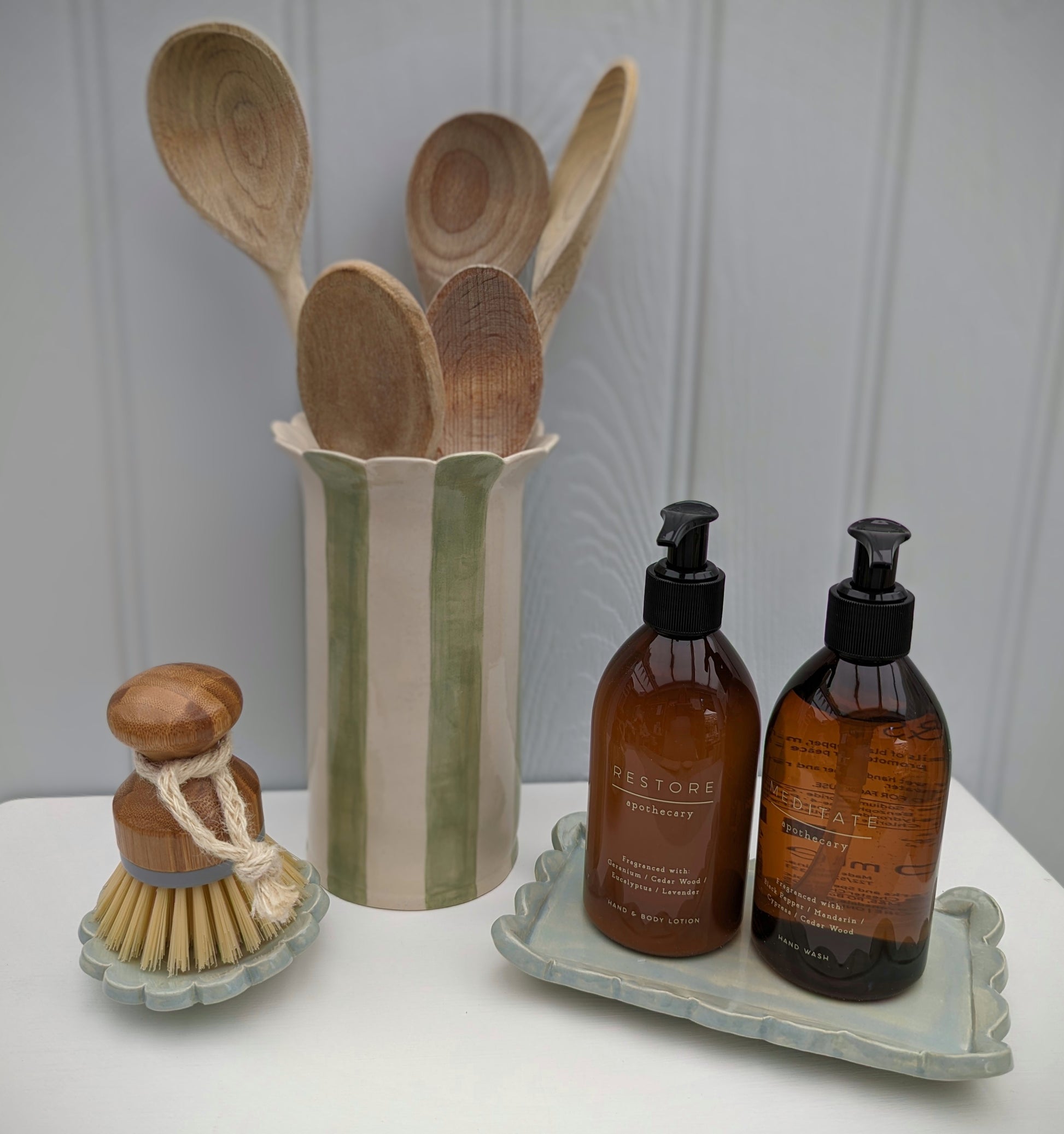 Sage kitchen utensil holder with matching items