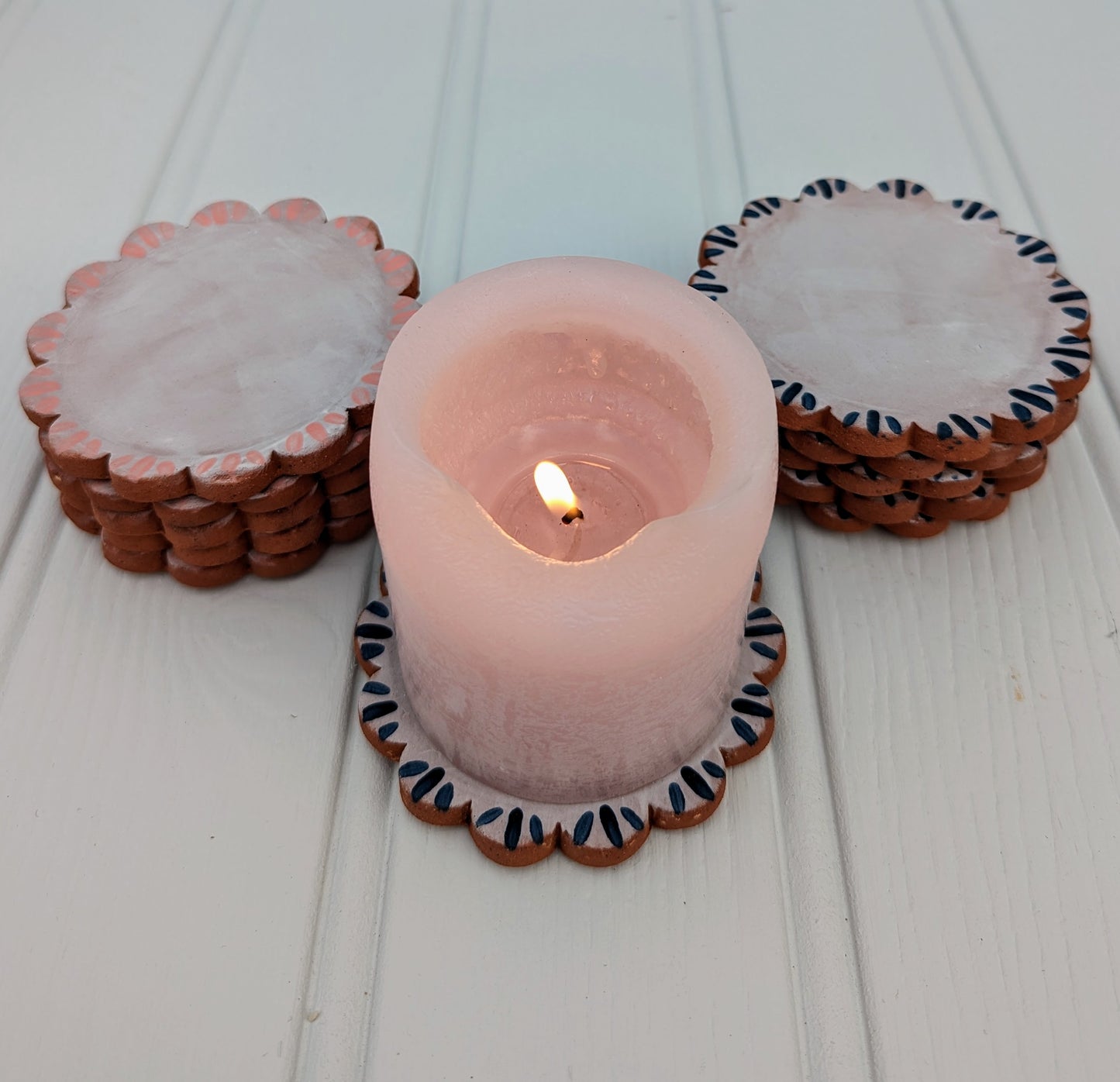 Scalloped candle stand